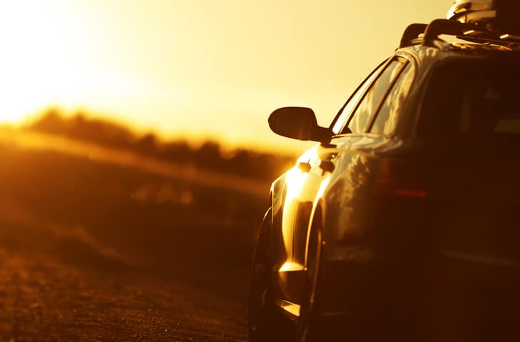 Car driving at golden hour